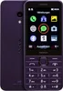 A purple Nokia feature phone is shown from the front and back, displaying its screen with app icons and a keypad. Podgląd zdjęcia produktu