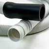 Close-up of flexible hoses, one with a black rubber grip and the other ribbed and gray. Produktbild-Vorschau