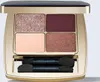 An open Estée Lauder eyeshadow palette with four shades and two applicators. Podgląd zdjęcia produktu