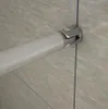 A close-up view of a shower enclosure fitting, showing a metal rod attached to a glass panel. Produktbild-Vorschau