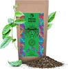 A bag of Pachamama Guayusa tea with some leaves and a pile of tea leaves in front. Náhled obrázku produktu