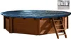An above-ground wooden pool covered with a blue tarp and a wooden ladder leaning against it. Produktbild-Vorschau