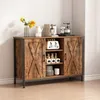 A rustic-style sideboard with sliding barn doors, displaying kitchen appliances and decorative items on top and inside. Náhľad obrázku produktu
