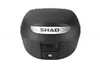 A black SHAD top case for a motorcycle, shown from the front on a white background. Anteprima dell’immagine prodotto
