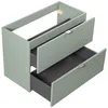 A green vanity cabinet with two drawers, one partially open. Produktbild-Vorschau