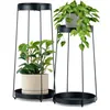 Two black metal plant stands, each holding a potted plant, are displayed against a white background. Produktbild-Vorschau