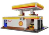 A Lego-style model of a Shell gas station with a shop and car wash. Podgląd zdjęcia produktu