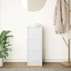 A white cabinet with three drawers stands in a room with a plant and a coat rack. Podgląd zdjęcia produktu