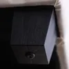 Close-up of the bottom corner of a sofa leg. Produktbild-Vorschau