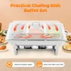 A chafing dish buffet set with three compartments, showing food inside and arrows indicating steam circulation. Podgląd zdjęcia produktu