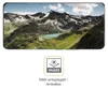 A smartphone screen displaying a mountain landscape, with a graphic icon and text below indicating a matte, anti-reflective finish. Produktbild-Vorschau