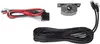 A collection of car audio accessories, including wiring harnesses, a remote bass knob, and a coiled audio cable, laid out on a white background. Voir les images du produit