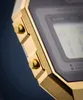 A close-up shot of a gold-colored digital watch. Voir les images du produit