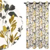 A close-up of a curtain pattern and a full curtain hanging. Produktbild-Vorschau