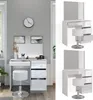 A white high-gloss vanity table with a stool and mirror, set against a light gray wall with a window and a clock. Podgląd zdjęcia produktu