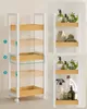 A multi-panel image showcasing a white and wood bathroom storage cart with three shelves. The left panel shows the cart with numbered indicators demonstrating adjustable shelf placement. The right panels display the cart filled with various bathroom items  Náhled obrázku produktu