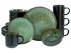 A collection of stoneware dishes and mugs with a green and black glaze. Produktbild-Vorschau