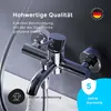 A close-up of a chrome bathtub faucet with water flowing from the spout, set against a dark gray background. Produktbild-Vorschau