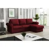 A red sectional sofa is shown in a living room setting with a coffee table in front of it. Náhľad obrázku produktu