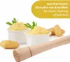 Mashed potatoes in bowls with a potato masher and potatoes in the foreground, with marketing text in the upper right corner. Podgląd zdjęcia produktu