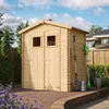 A wooden garden shed with gardening tools leaning against it, set in a backyard with a paved patio and garden plants. Podgląd zdjęcia produktu