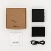 The image displays the contents of a coffee scale packaging, including the box, instructions, and accessories. Produktbild-Vorschau