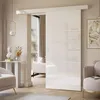 A modern living room with a white high-gloss sliding door. Produktbild-Vorschau