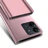 A close-up shot of a pink smartphone case with a clear view flip cover, showing the camera module. Produktbild-Vorschau
