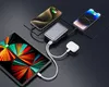 A power bank is charging multiple devices, including two smartphones and a tablet, along with a pair of wireless earbuds. Produktbild-Vorschau