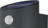 A close-up shot of a dark gray solar-powered wall light with a motion sensor. Anteprima dell’immagine prodotto