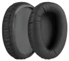 Two black ear pads for headphones are shown against a light gray background. Produktbild-Vorschau