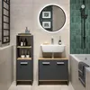 A modern bathroom with a vanity set, sink, mirror, and bathtub. Produktbild-Vorschau