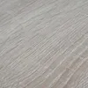 A close-up view of a wood-like textured surface. Produktbild-Vorschau