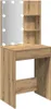 A makeup vanity table with a mirror and shelves, made of wood-like material. Voir les images du produit