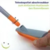 Close-up of a broom handle being attached to a broom head, with text overlay explaining the feature. Produktbild-Vorschau