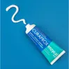 A tube of Curaprox Enzycal 1450 toothpaste with a swirl of toothpaste on a blue background. Anteprima dell’immagine prodotto