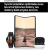 A Samsung foldable phone, smartwatch, and earbuds are displayed together, with text promoting the Galaxy ecosystem. Podgląd zdjęcia produktu