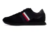 A single black sneaker is shown from the side against a white background. Náhled obrázku produktu