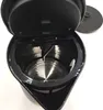 Top-down view of the inside of an open black electric kettle. Podgląd zdjęcia produktu