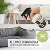 A hand is spraying a dog bed with a parasite spray. The product bottle is visible, and there is text overlaying the image. Produktbild-Vorschau