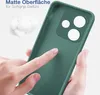 A hand is touching a green phone case, highlighting its matte surface and soft grip. Produktbild-Vorschau