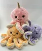 Three plush octopus toys stacked on top of each other against a white background. Produktbild-Vorschau