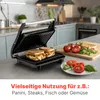 A kitchen counter with a panini grill and ingredients. Produktbild-Vorschau