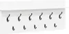 A white wall-mounted coat rack with a shelf and multiple black hooks. Voir les images du produit