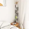 A bedroom corner with a bed, nightstand, and a corner shelf unit. Náhľad obrázku produktu