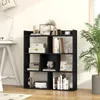 A black wooden bookshelf filled with books and decorative items, placed in a room with a desk and a plant. Podgląd zdjęcia produktu