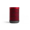 A red and black cylindrical speaker on a white background. Náhled obrázku produktu