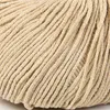 A close-up view of beige yarn. Náhled obrázku produktu