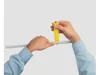A person's hands are shown using a yellow cable stripping tool on a gray cable. Produktbild-Vorschau