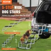 A dog is using a set of wide dog stairs to get into the back of a car. The stairs are shown in two configurations, with dimensions indicated. Podgląd zdjęcia produktu